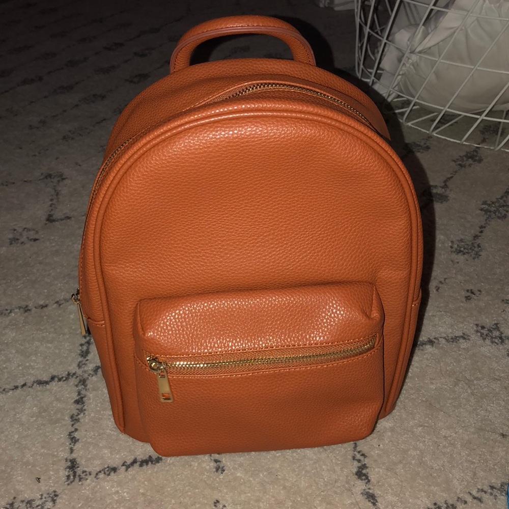Brown leather mini backpack